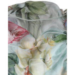 Dolce & Gabbana Blue Floral Print Tiered Long Maxi Dress close-up view showing delicate floral print in vibrant colors.