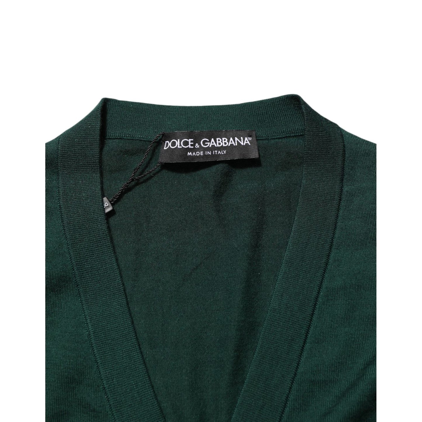 Dolce & Gabbana Dark Green Button Down Men Cardigan Sweater - Close-up of label on dark green cashmere fabric.