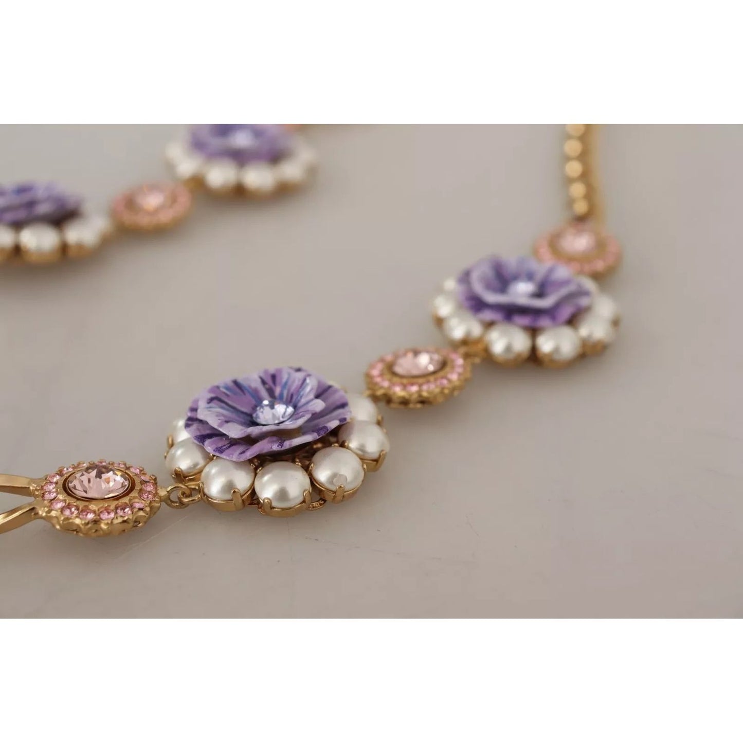 Dolce & Gabbana Gold Tone Floral Crystals Purple Embellished necklace with floral charms and purple accents, luxury design.