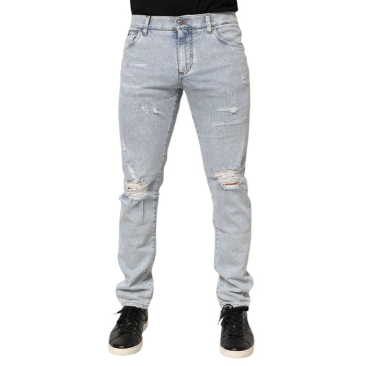 Dolce & Gabbana Light Blue Distressed Slim Fit Ripped Denim Jeans on model showcasing the trendy edgy design.