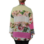 Back view of Dolce & Gabbana Multicolor Floral Patchwork Silk Ascot Collar Top showcasing vibrant floral design.