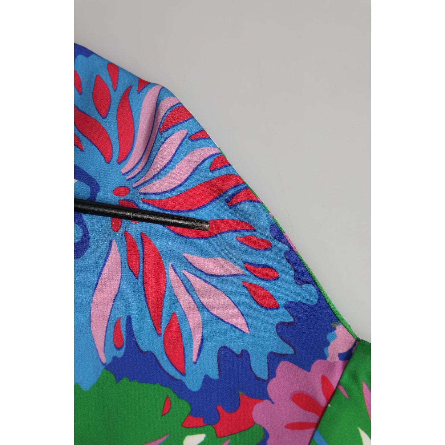 Close-up of Dolce & Gabbana Multicolor Floral Print Silk Tunic Blouse Top fabric detailing.