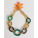 Dolce & Gabbana Multicolor Gold Brass Tiger Lily Floral Chai Necklace featuring gold-tone chains, green resin, and orange flower clasp.