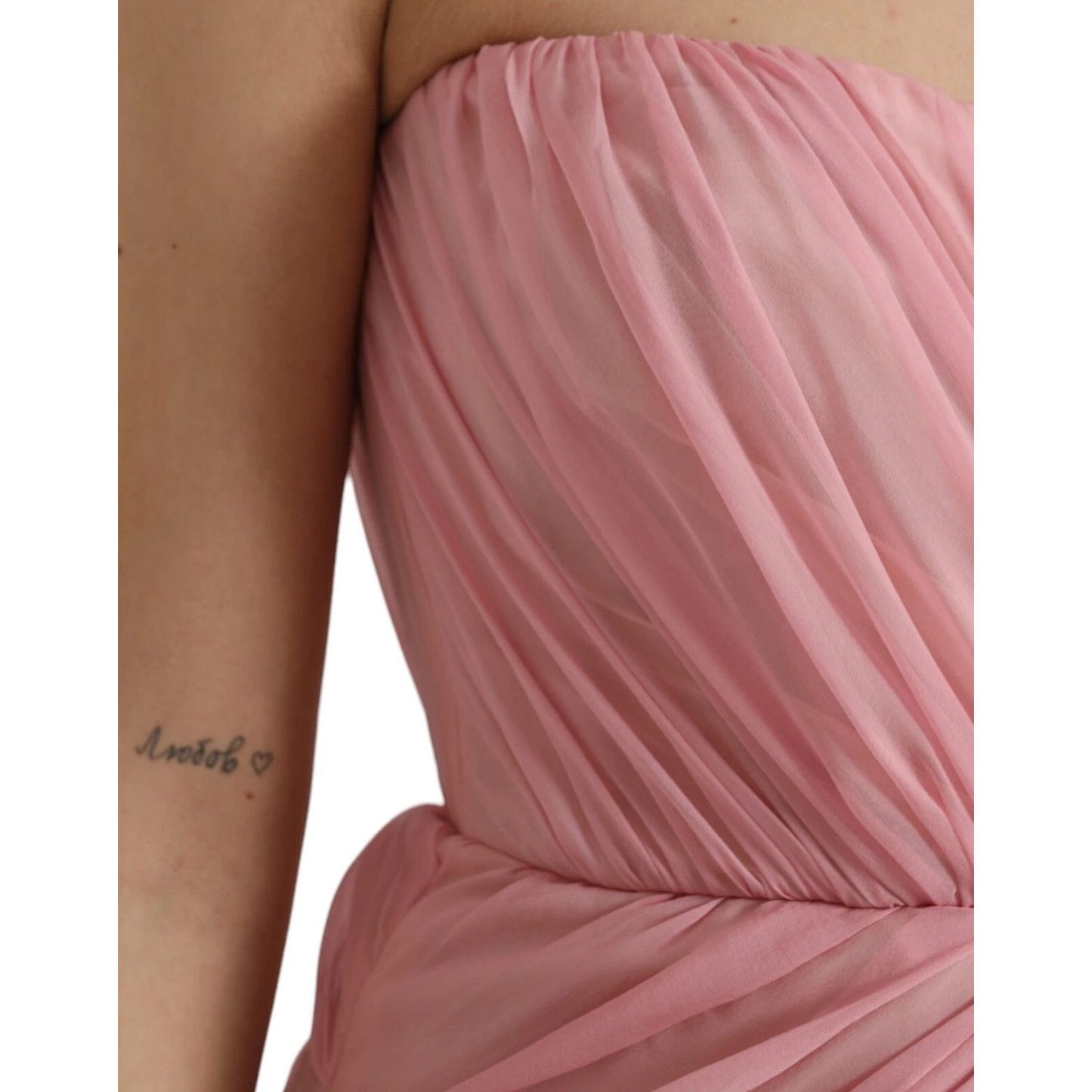 Close-up of a model wearing a Dolce & Gabbana Pink Silk Strapless Maxi A-line Gown Dress, highlighting the elegant silk fabric texture.