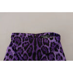 Dolce & Gabbana Purple Leopard Print Pencil Cut Mini Skirt with logo detail and zipper closure on high waist, minor defect visible.