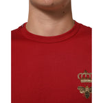 Close-up of Dolce & Gabbana Red Crown Bee Cotton Short Sleeve T-shirt featuring regal bee and crown motif.