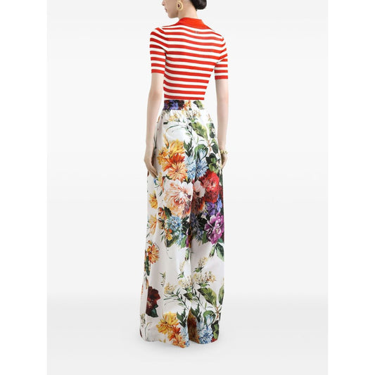 Dolce & Gabbana Striped Polo Top with red and white stripes, white floral pants; back view showcasing short sleeves and straight hem.