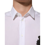 Close-up of Dolce & Gabbana White Cotton GOLD DGPatch Formal Dress Shirt with collared design and logo patch detail.