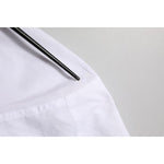 Close-up of collar detail on Dolce & Gabbana White Cotton GOLD DGPatch Formal Dress Shirt with black hanger.