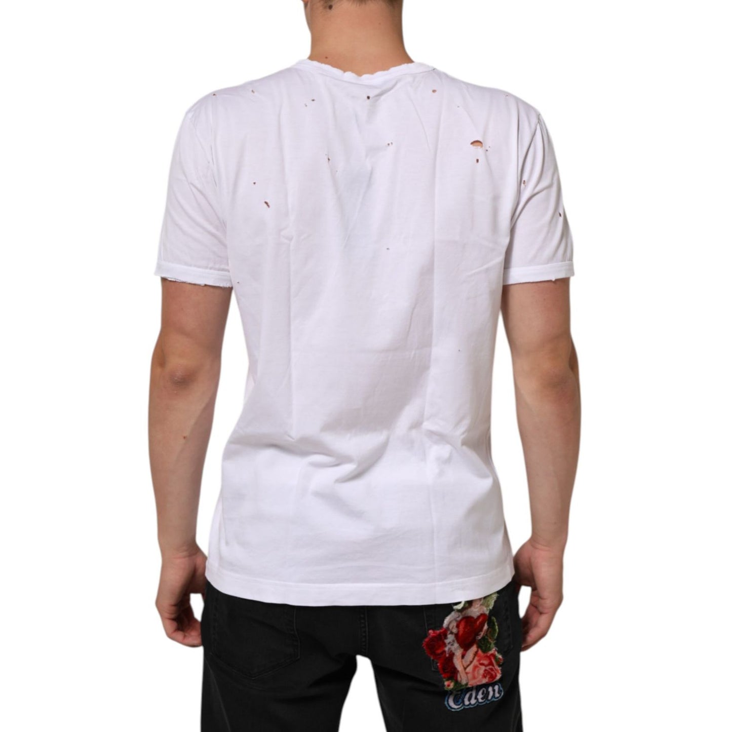 Back view of Dolce & Gabbana White Distressed Cotton V Neck Men T-shirt with short sleeves, showcasing casual elegance and Italian style.