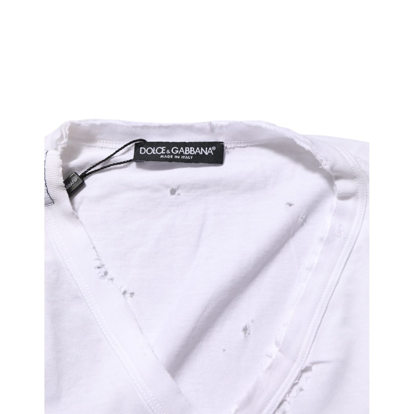 Dolce & Gabbana White Distressed Cotton V Neck Men T-shirt with label detailing the classic style and distressed finish.