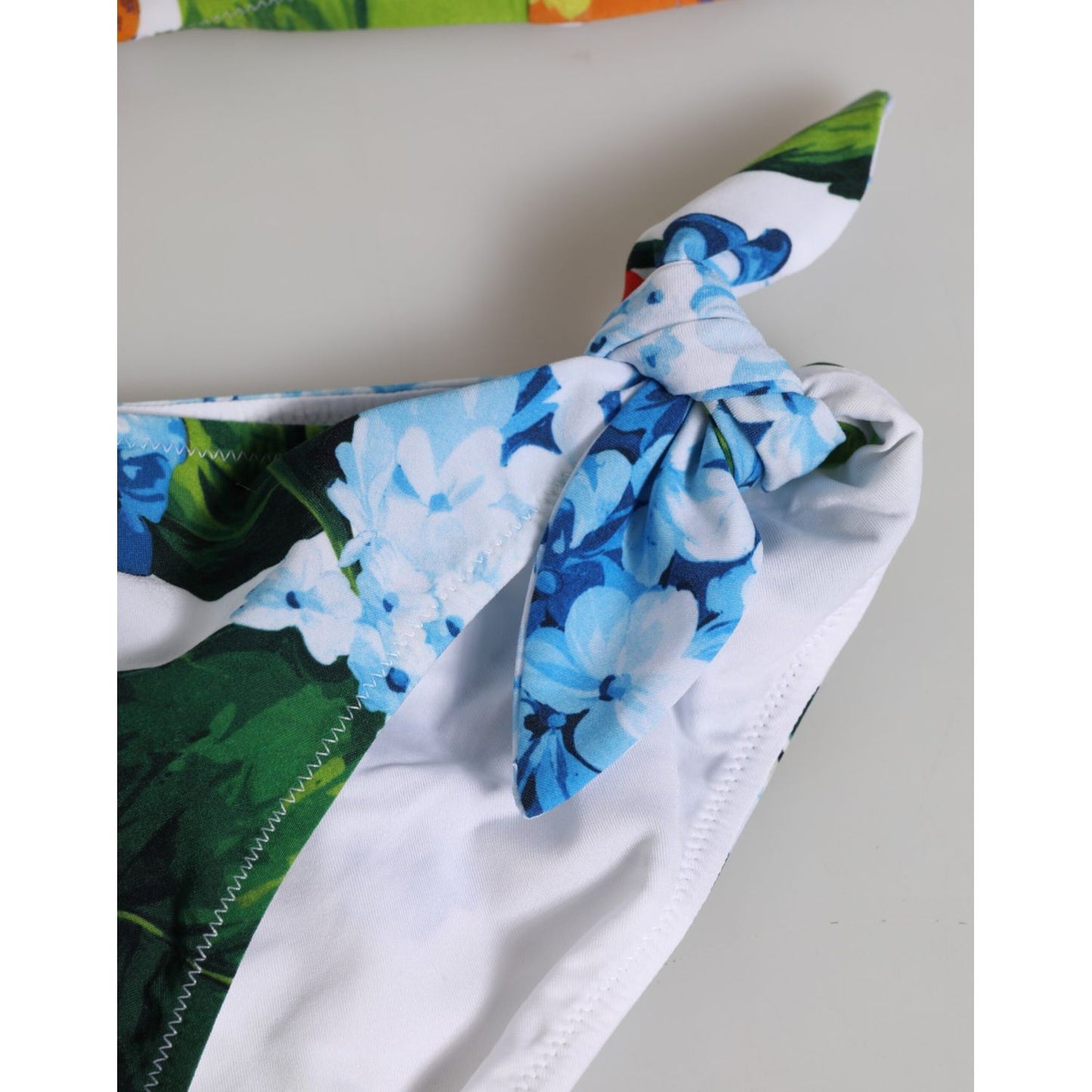 Dolce & Gabbana White Floral Swimsuit 2 Piece Top Bottom Swimwear close-up of floral print detail on bikini bottom.