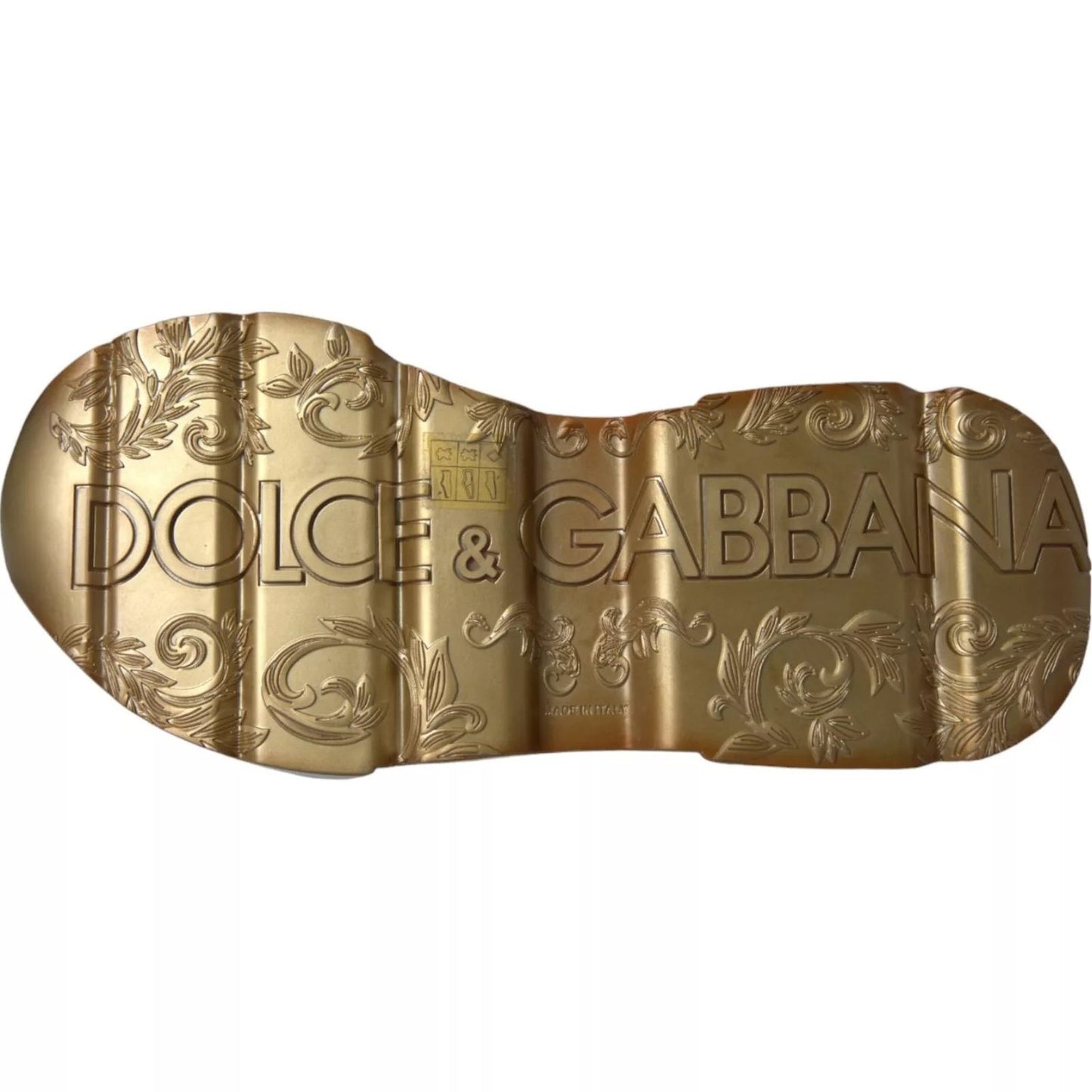 Sole of Dolce & Gabbana White Gold DAYMASTER Leather Sneakers Mens Shoes with embossed logo design.
