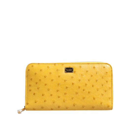Dolce & Gabbana Yellow Leather Logo Plaque Zip Around Continental Wallet, luxury wallet with logo engraved metal hardware.