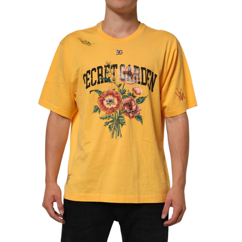 Dolce & Gabbana Yellow Secret Graden Floral Cotton CrewNeck T-shirt with floral print and crew neckline, worn by a male model.