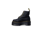 Dr. Martens Black Leather Boot with lace-up, rubber sole, iconic design for women, perfect balance of style and comfort.