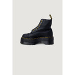 Dr. Martens Black Leather Boot with lace-up design and rubber sole, showcasing iconic style and comfort for women.