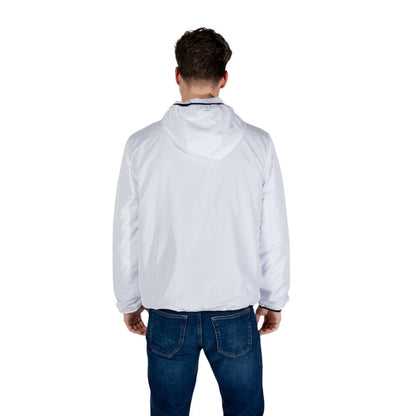 Back view of EA7 Emporio Armani White Polyester Shell Jacket worn by a man, showcasing its lightweight and stylish design.