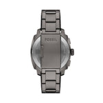 Back view of FOSSIL Mod. MACHINE gent's wristwatch with 44 mm case, displayed with official packaging.