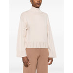 Woman wearing Fabiana Filippi Sweaters Powder light beige high neck ribbed knit wool jumper