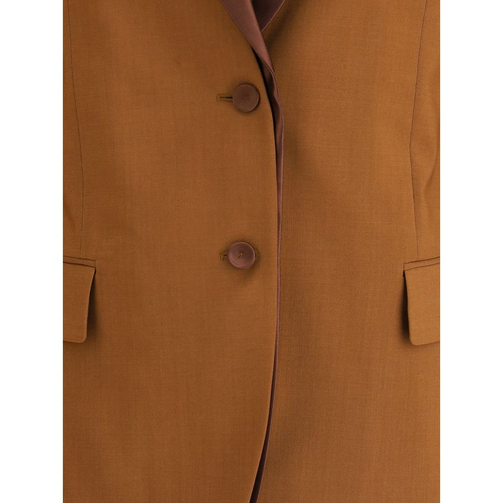 Close-up of Fendi Brown Wool Blazer with satin lapels, single-breasted button closure, and front flap pockets.