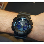 CASIO G-SHOCK Mod. GS BASIC wristwatch showing multifunction dial on a wrist, water-resistant, resin case and strap, quartz movement.