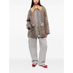 GANNI Jackets Brown animal print cotton blend jacket with wide peak lapels and front button fastening, worn by model.