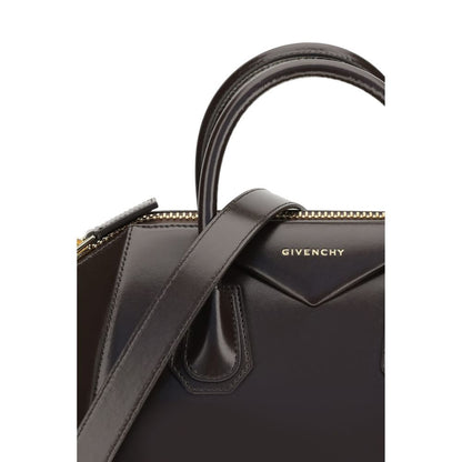 Givenchy Brown Calf Leather Bos Taurus Handbag with logo and handles, showcasing glossy finish and elegant design.