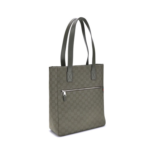 Gucci GG canvas medium Tote Bag with green leather trimmings and signature Web detail, rear view, showcasing zipper pocket.
