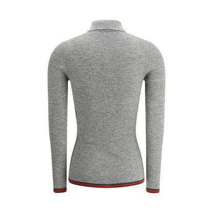 Back view of Gucci Gray Cashmere Top with ribbed design and iconic colored bands on hem and cuffs.