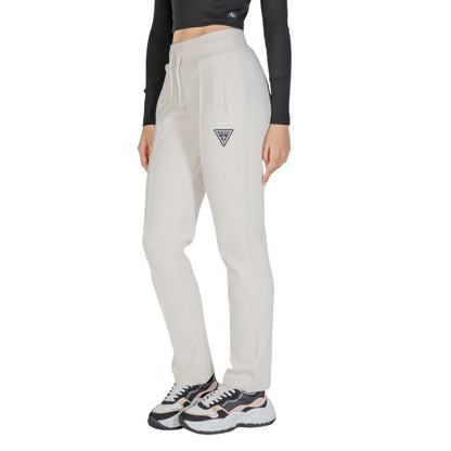 Woman wearing Guess Active Cream Cotton Joggers (Workout Pants) with a straight leg design for comfort and style.