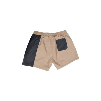 Hugo Boss Beige Polyester Swim Briefs with contrasting black panel and pocket, designed for quick-drying comfort at the beach or poolside.
