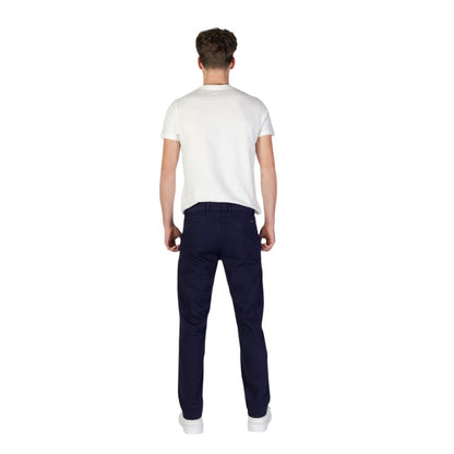 Rear view of man wearing Hugo Boss Blue Cotton Skinny Pants for a modern, slim fit style.