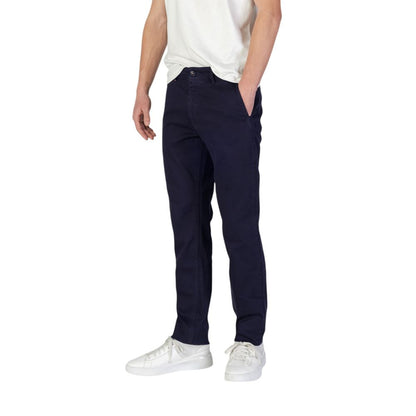 Model wearing Hugo Boss Blue Cotton Skinny Pants, showcasing the slim fit design ideal for modern men seeking style and comfort.