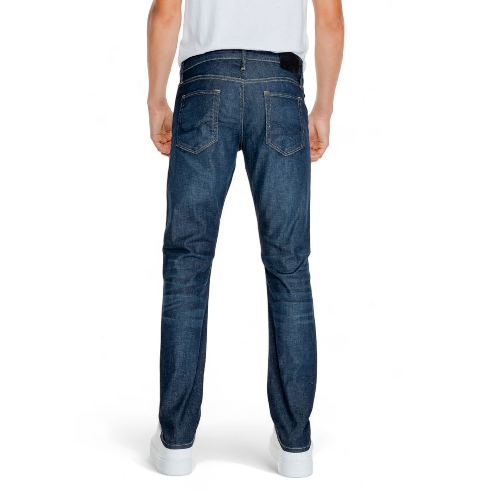 Man wearing Jack Jones Blue Cotton Relaxed Fit Jean showcasing comfortable and stylish loose fit denim for a modern casual look.