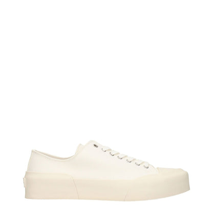 Jil Sander Beige Fabric Low Top Sneakers with lace-up closure and rubber sole, featuring a back logo and round toe design.