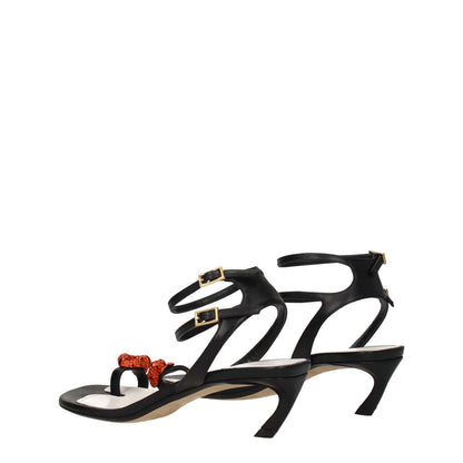 Lanvin Black Leather Stiletto Heel Sandals with rhinestone detail, buckle closure, mid heels, and open toe design, side view.