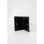 Open Love Moschino Bicolor Polyethylene Wallet showcasing quilted faux leather with metallic logo and multiple compartments.