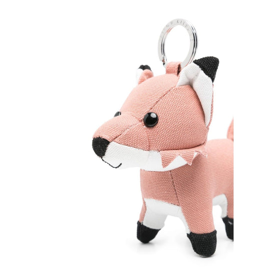 Maison Kitsuné Fox bag charm in pink, featuring a signature fox motif with pop-up ears and engraved logo keyring attachment.