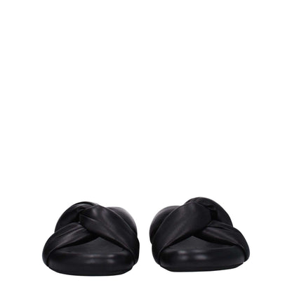 Marni Black Leather Slippers with open toe, mid heels, and side logo, featuring black leather and gold details, perfect for casual wear.