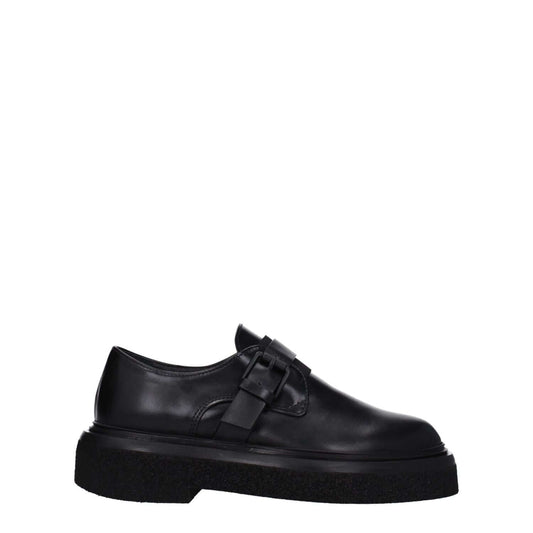 Max Mara Black Leather Oxfords And Derbies with buckle closure and rubber sole.