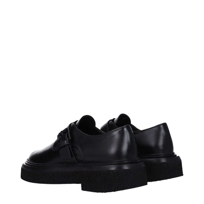 Max Mara Black Leather Oxfords And Derbies with buckle closure and rubber sole, featuring a casual style design with a low flat heel.