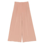 Norma Kamali Trousers Beige with high-waisted wide-leg design and elasticated waistband, featuring two side pockets. Perfect for stylish comfort.