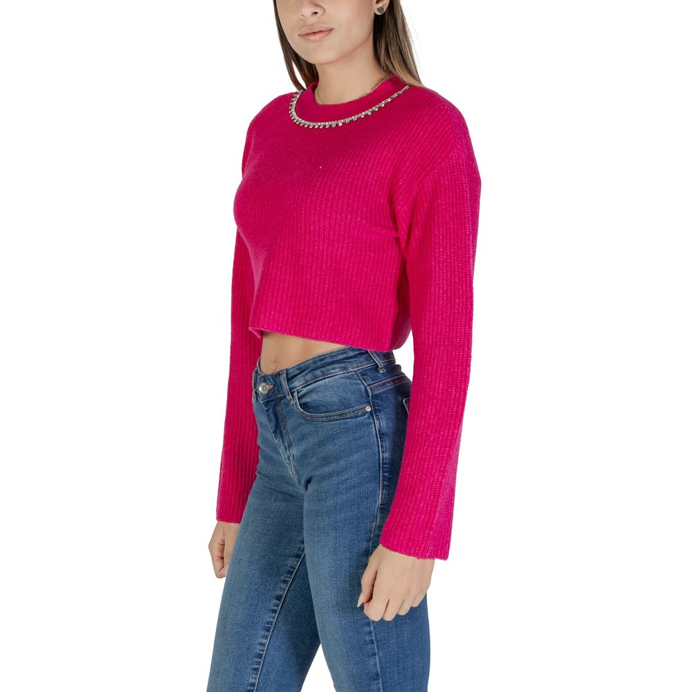 Woman wearing Only Pink Recycled Polyester Sweater from fall winter collection, featuring knitwear material with jeans
