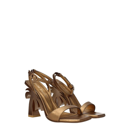 Palm Angels Gold Leather Platform Sandals with buckle closure and high heels in dark gold, featuring an open toe design.