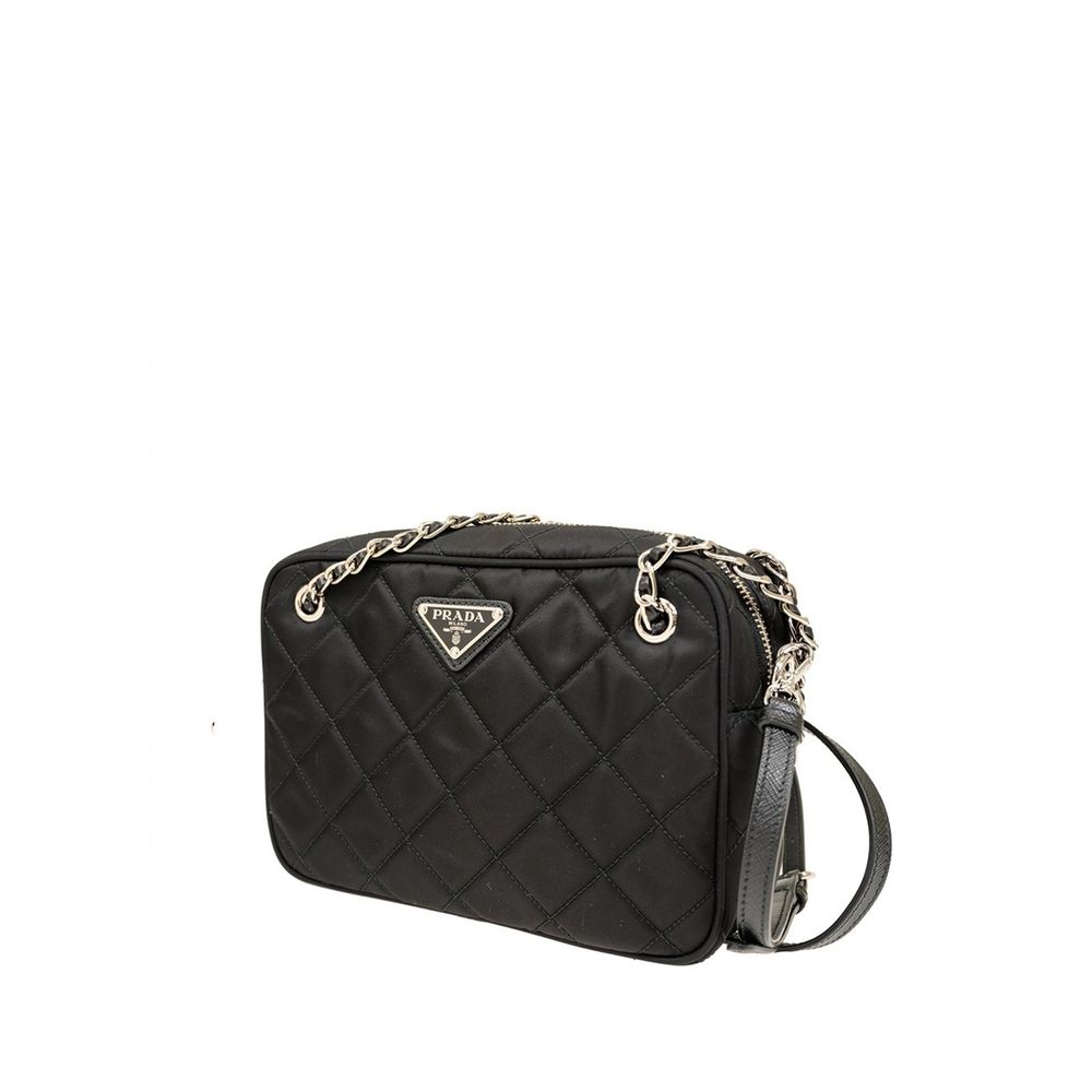 Front view with bag zipped and handles upright.