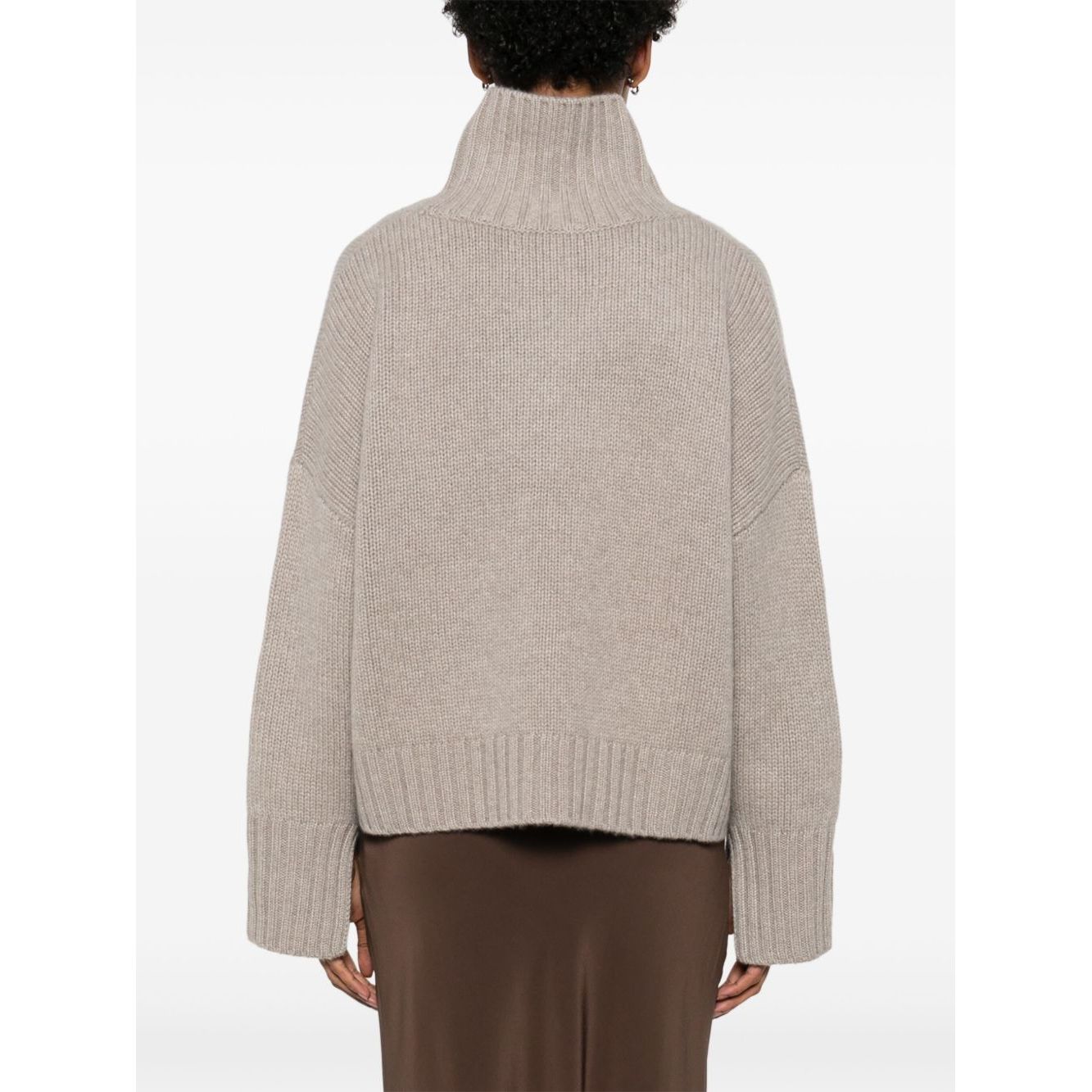 Back view of SOFT GOAT Sweaters Light Grey on model, featuring taupe grey ribbed trim, high neck, drop shoulder, and long sleeves.