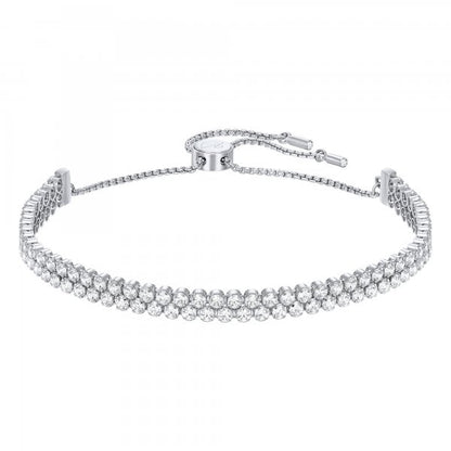 Elegant Swarovski silver bracelet with crystal detailing, adjustable clasp, perfect for adding a touch of luxury to any outfit