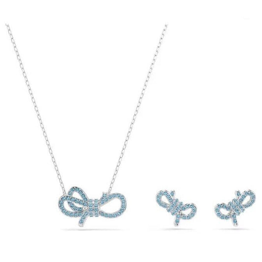 SWAROVSKI Mod. 5723554 Lifelong Bow Set with blue crystals and rhodium plating, featuring necklace and earrings in bow design.