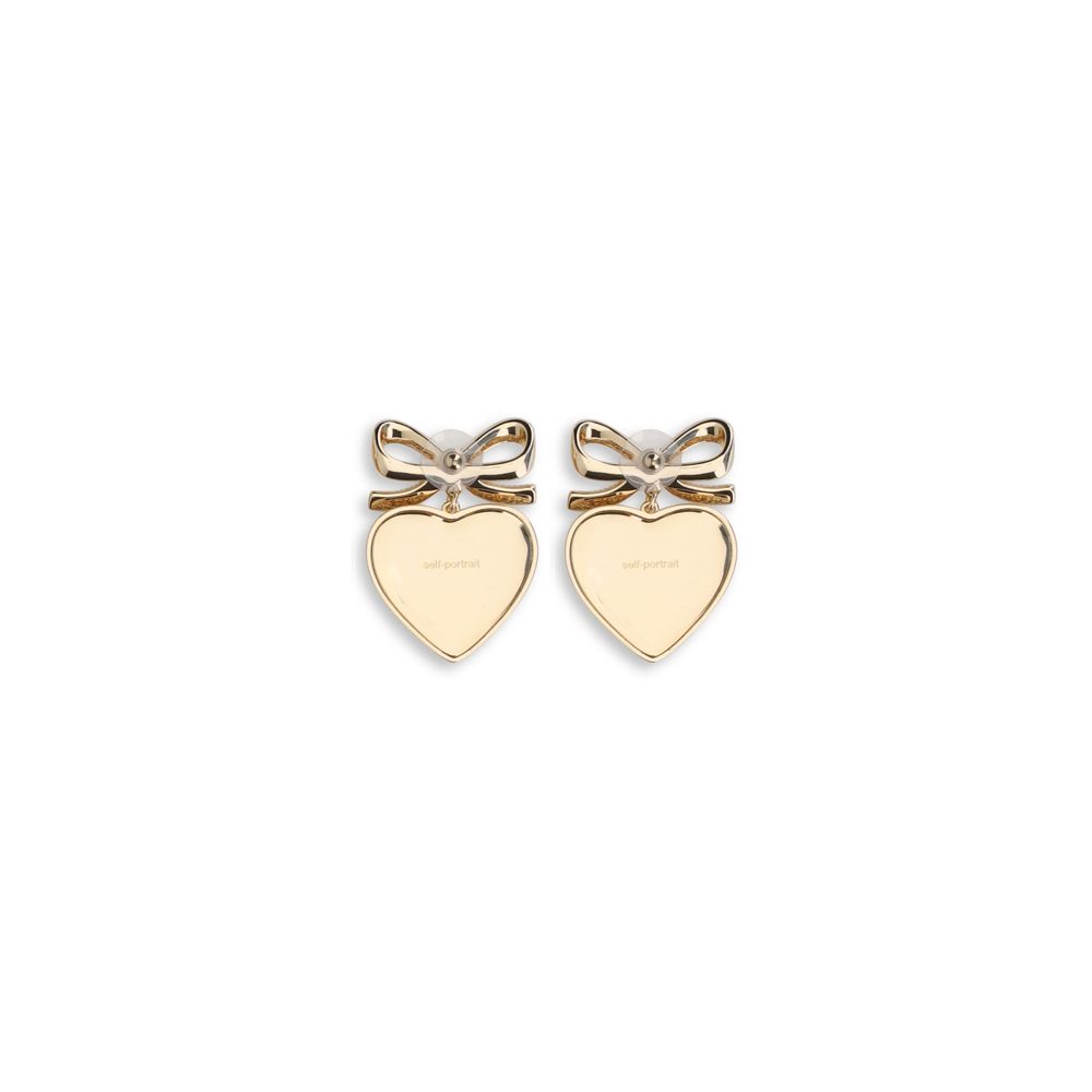 Self-Portrait Gold Brass Earrings with heart-shaped bow design and crystal accents.